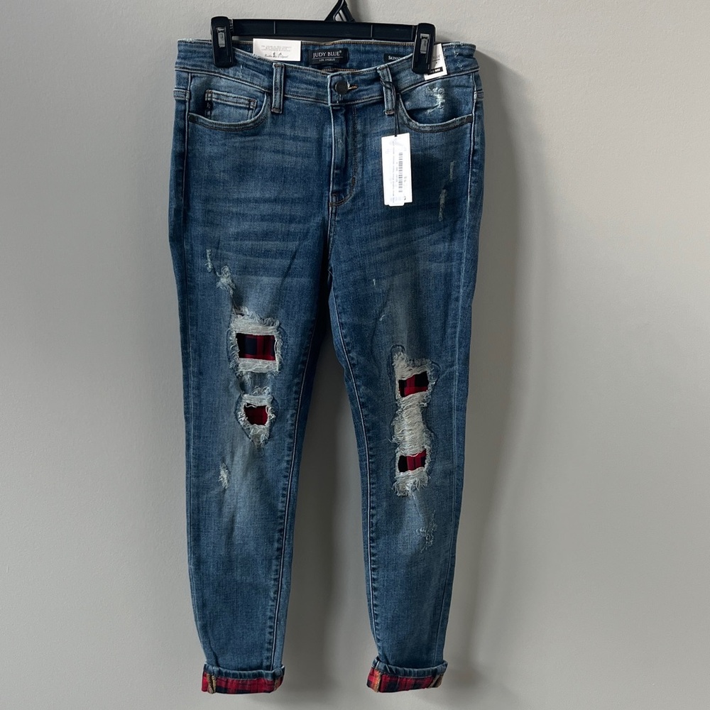 Distressed Blue Jeans with Red Accents